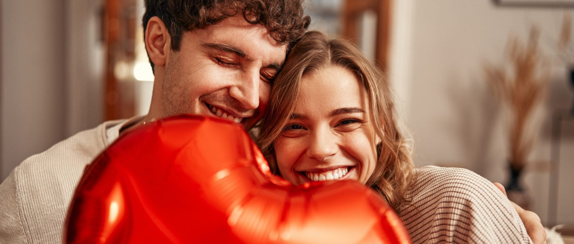 Happy,Valentine's,Day.,Young,Couple,In,Love,Holding,A,Heart-shaped